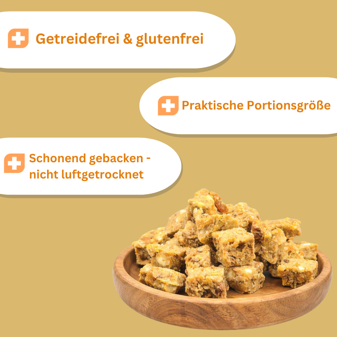 Schüssel mit Snackies; Textfelder: "Getreidefrei & glutenfrei", "Praktische Portionsgröße", "Schonend gebacken - nicht luftgetrocknet".